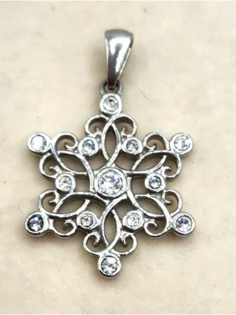 Snowflake-Shaped Silver Tone Pendant With Rhinestone Accents